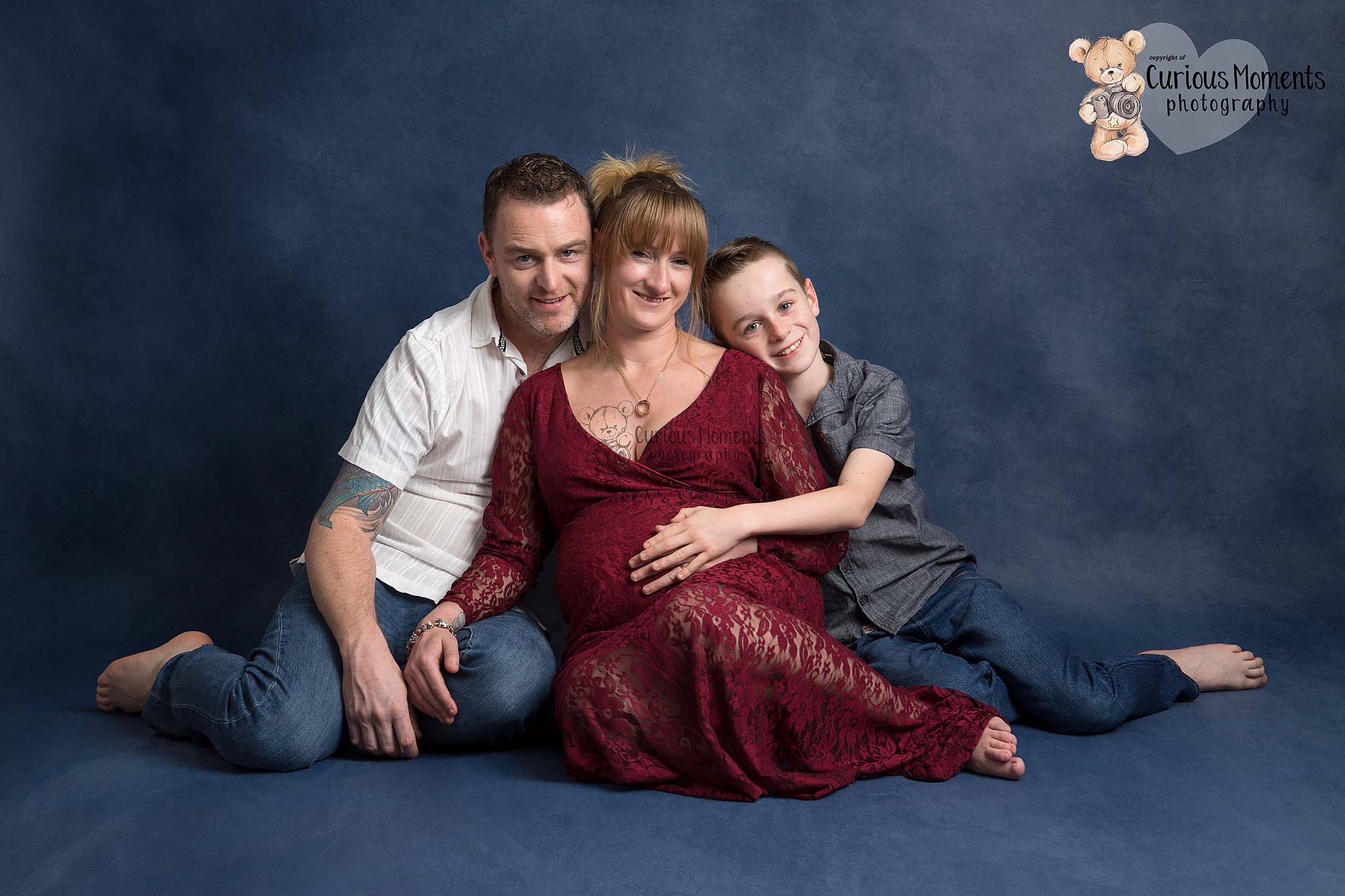 pregnant mummy photoshoot in a studio with husband and son by Maternity Photographer Carmarthen