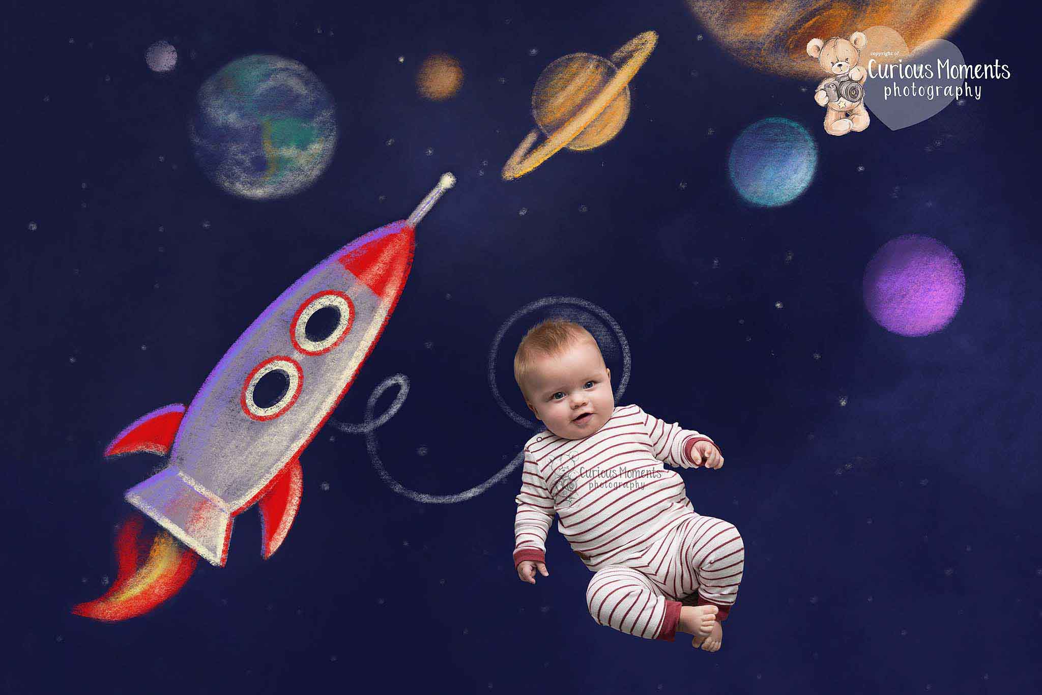 Image of baby boy floating in space